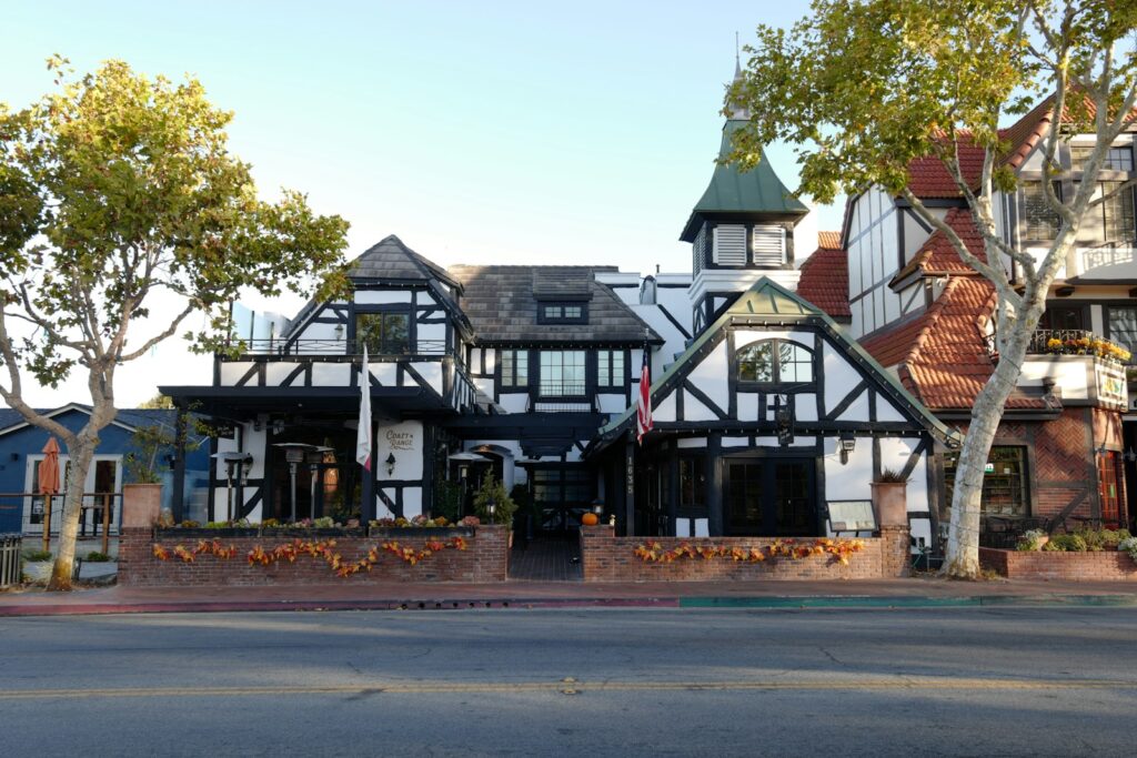 Danish inspired white home with brown detailing in Solvang, CA