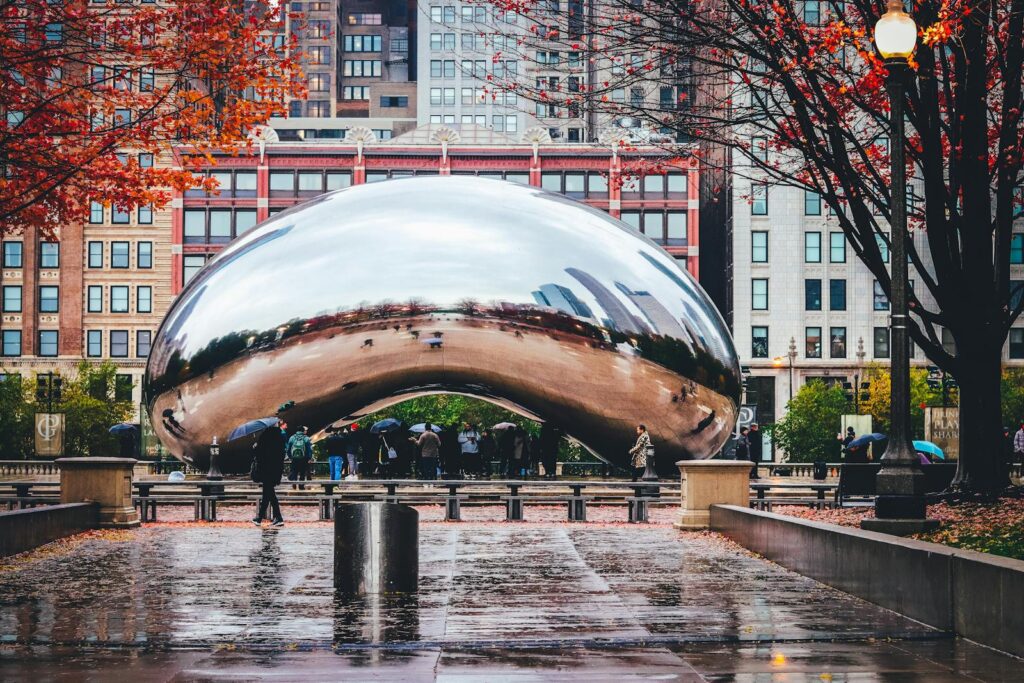 silver sculpture in a city setting