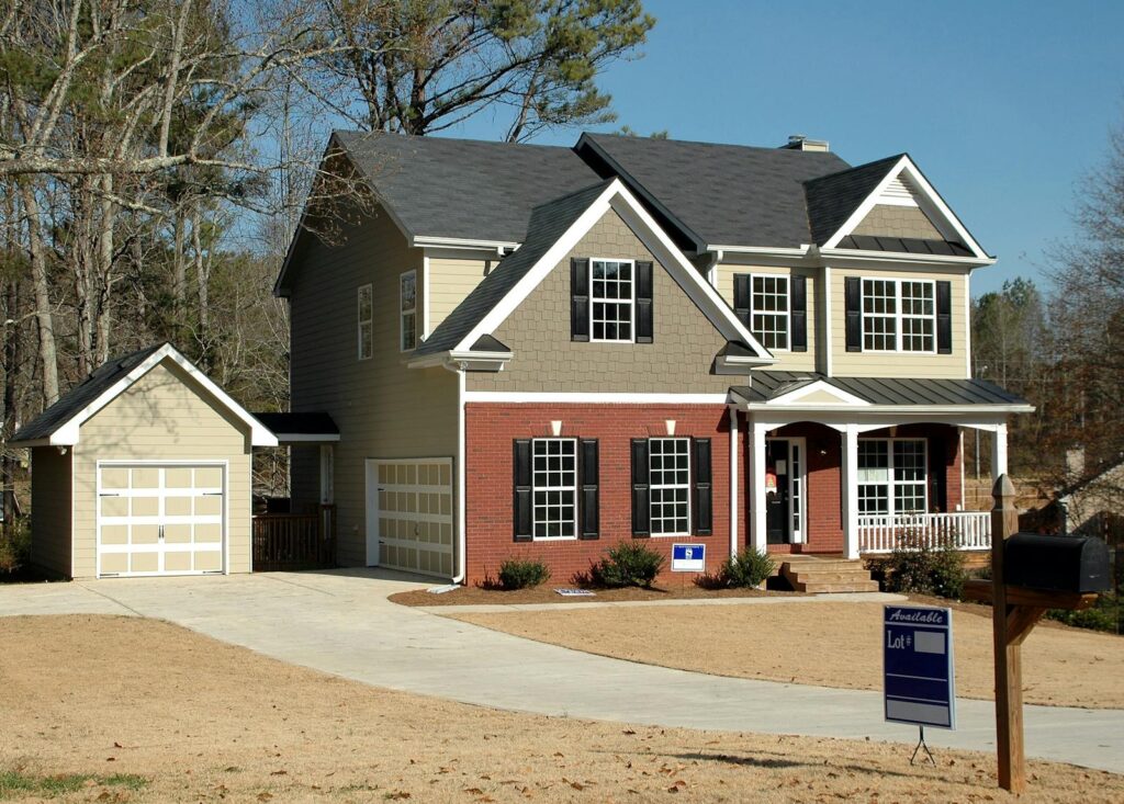 Two-story home with garage in a serene neighborhood.