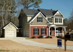 Two-story home with garage in a serene neighborhood.