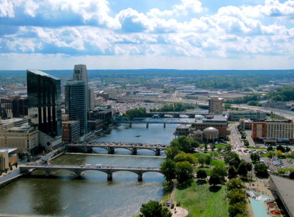 city buildings with bridges over water